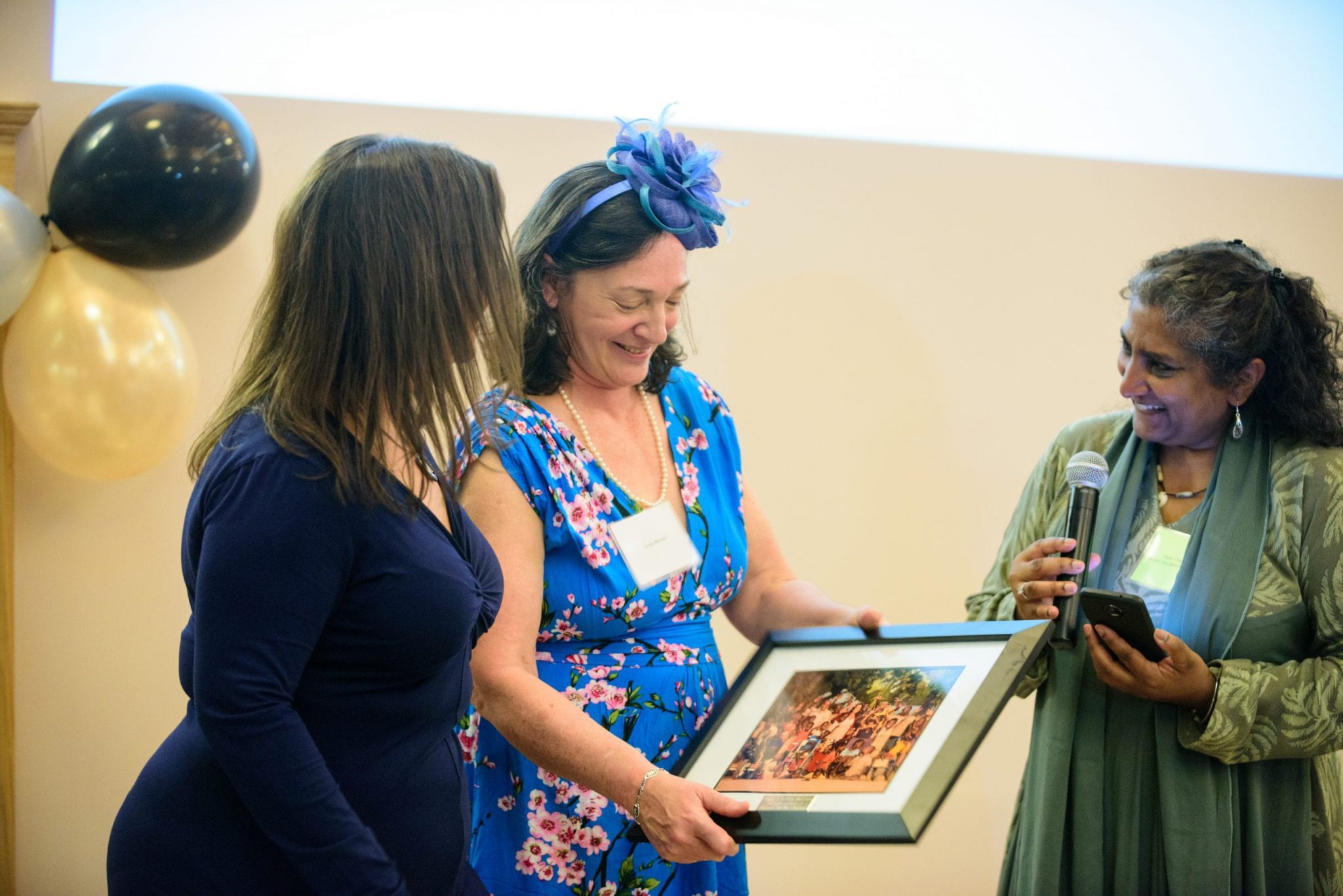 Foundation donor receiving award and thank you gift at Kupenda's 2019 gala