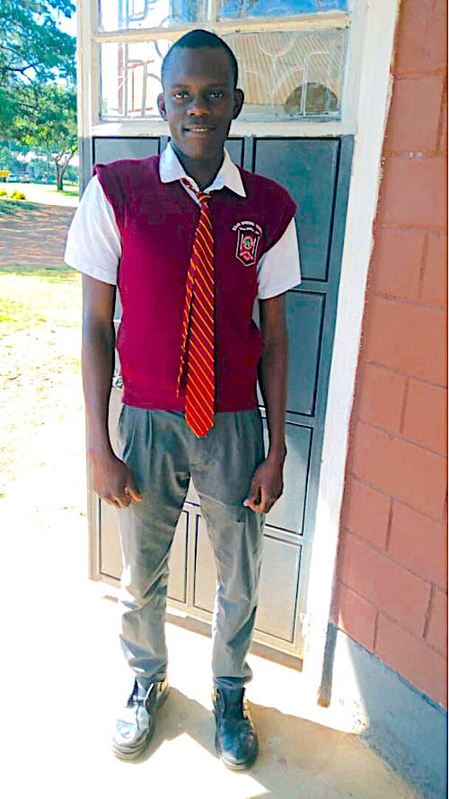 Kenyan boy in school uniform