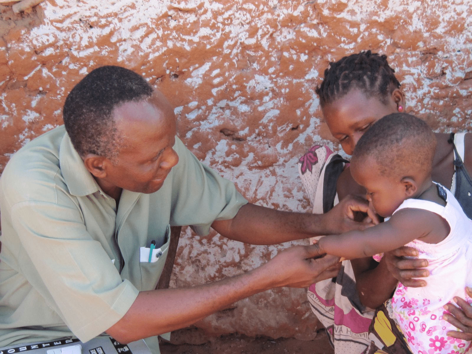 man helping baby