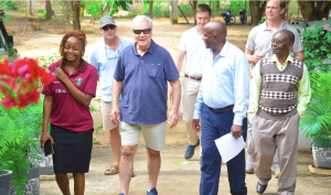 Trevor walking with Kupenda staff